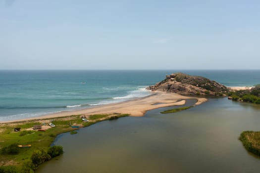 Aerial drone of Beautiful tropical beach and blue ocean. Elephant Rock, Sri Lanka.