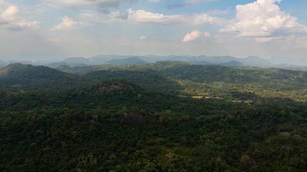 Aerial view of Mountains with rainforest and clouds. Sri Lanka.