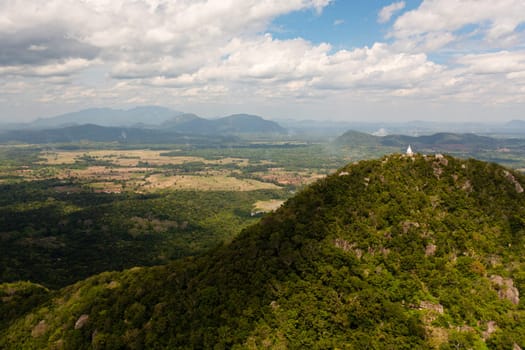 Aerial drone of among mountains and hills with rainforest and jungle. Sri Lanka.