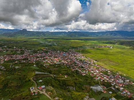 Aerial view of agricultural land with plantings and tea estate landscape. Kayu Aro, Sumatra, Indonesia.