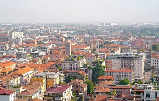 View of the old city from the hill. Landscape in the city center, its historical buildings, churches and towers.