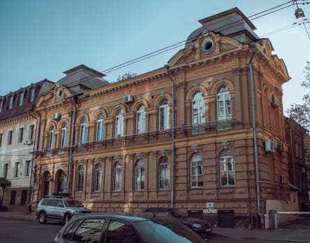 City center building with panoramic windows photo, Kharkiv, Ukraine. The historical center with old architecture. High quality picture for wallpaper, travel blog.