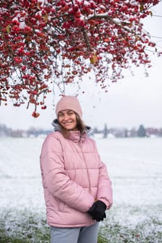 Winter Elegance: Portrait of a Beautiful Girl in a Snowy European Village