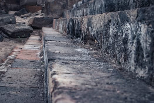 Ruins of an ancient Christian temple stairway close up photo. Collapsed church. Zvartnos temple in Armenia. High quality picture for magazine, article