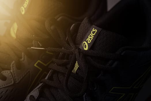 Antalya, Turkey - November 28, 2023: Close-up of the logo on Asics running shoes