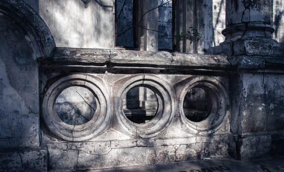 Close up abandoned mansion concept photo. Castle parapet ruins view. Ruined ancient gazebo in Ukraine. A beautiful historical building in a European city.