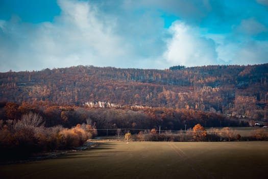 Autumn view of the Pyrenean mountains in Poland concept photo. Beautiful views in Polish countryside. High quality wallpaper. Ambient cloudy sky. Photo concept for travel blog, magazine, article