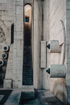 Carved steps staircase inside the arch modern architecture concept photo. Yerevan cascade giant stairway architecture. High quality picture for wallpaper