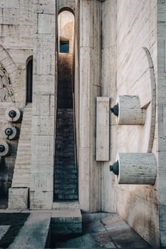 Carved steps staircase inside the arch modern architecture concept photo. Yerevan cascade giant stairway architecture. High quality picture for wallpaper