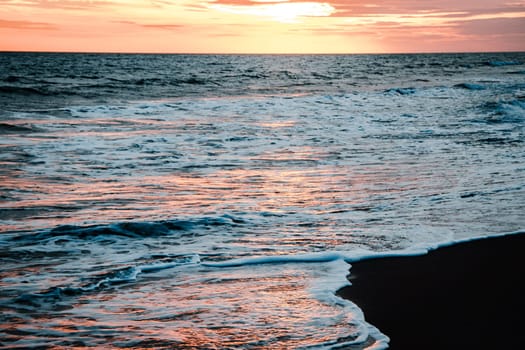 Calm water Mediterranean sea landscape photo. Peaceful time in Barcelona. Beautiful nature scenery photography with evening on background. High quality picture for wallpaper, travel blog