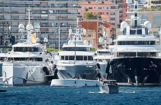 Monaco, Monte Carlo, 28 September 2022 - a lot of luxury yachts at the famous motorboat exhibition in the principality, the most expensive boats for the richest people around the world, yacht brokers. High quality photo