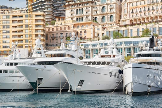 Monaco, Monte Carlo, 29 September 2022 - a lot of luxury yachts at the famous motorboat exhibition, the most expensive boats for the richest people, yacht brokers, boat traffic. High quality photo