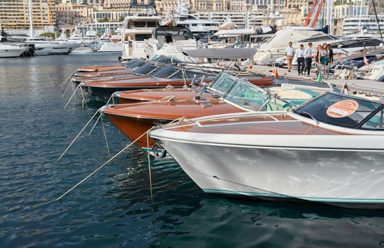 Monaco, Monte Carlo, 29 September 2022 - a lot of luxury yachts at the famous motorboat exhibition, the most expensive boats for the richest people, yacht brokers, boat traffic. High quality photo