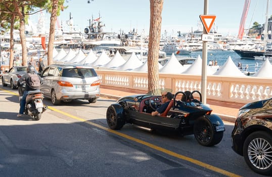 Monaco, Monte Carlo, 28 September 2022 - Exclusive car on the famous motorboat exhibition in the principality, the most expensive boats for the richest people around the world, yacht brokers. High quality photo