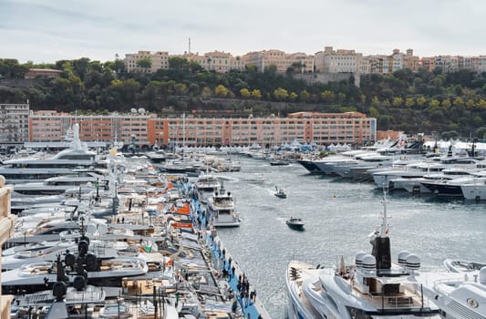 Monaco, Monte Carlo, 29 September 2022 - a lot of luxury yachts at the famous motorboat exhibition, the most expensive boats for the richest people, yacht brokers, boat traffic. High quality photo