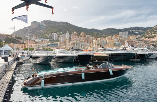 Monaco, Monte Carlo, 29 September 2022 - a lot of luxury yachts at the famous motorboat exhibition, the most expensive boats for the richest people, yacht brokers, boat traffic. High quality photo