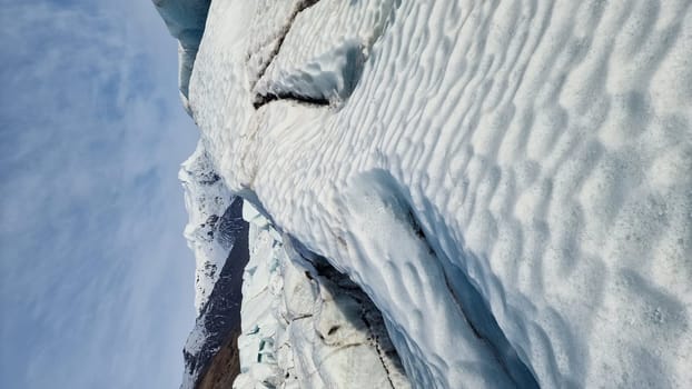 Blue glacial ice fragments on vatnajokull iceberg in nordic iceland, massive ice caves with frosty blocks creating magical arctic scenery. Breathtaking icy rocks within glacier lagoon, landmark.