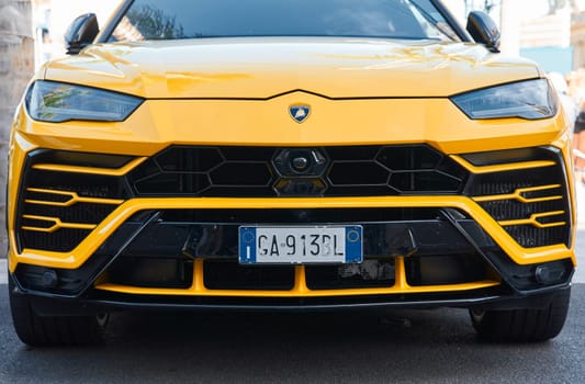 Monaco, Monte Carlo, 29 September 2022 - Close-up view of yellow sports car Lamborghini on street. High quality photo