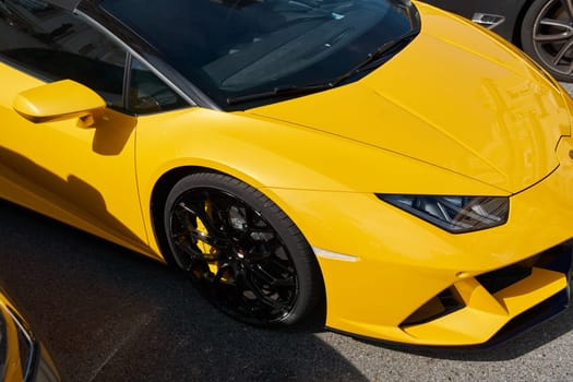 Monaco, Monte Carlo, 29 September 2022 - Close-up view of yellow sports car Lamborghini on street. High quality photo