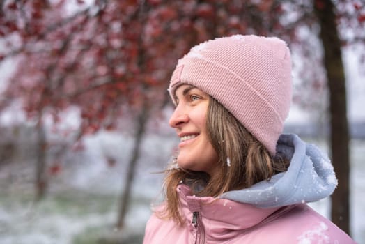 Winter Elegance: Portrait of a Beautiful Girl in a Snowy European Village