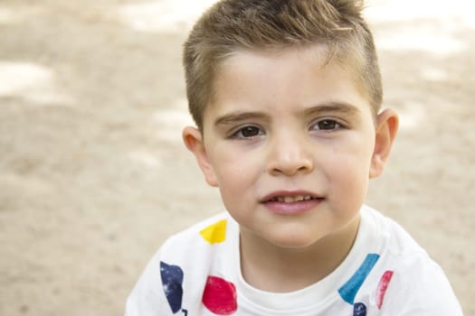 Portrait of four year old boy gesturing. One person