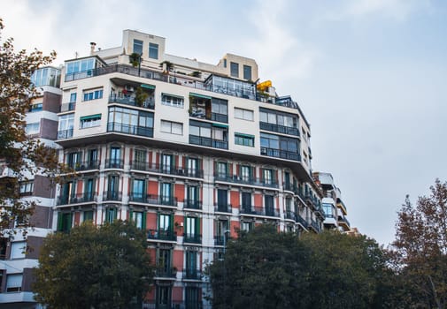 Modern apartment building with balcony, Barcelona. Beautiful urban scenery photography. Street scene. High quality picture for wallpaper, article