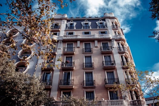 Old apartment building with balcony, Barcelona, Catalonia. Beautiful urban scenery photography. Street scene. High quality picture for wallpaper, article