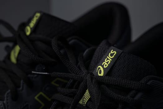 Antalya, Turkey - November 28, 2023: Close-up of the logo on Asics running shoes