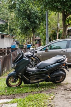 Black Motorcycle in Rural Setting