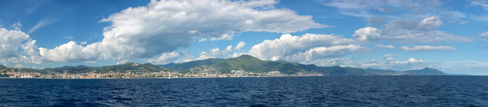 genoa town huge cityscape panorama from the sea on cloudy day