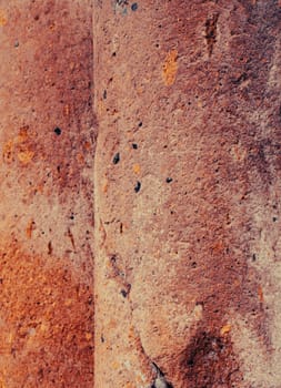 Close up old texture sandstone column photo. Mediterranean architecture, urban city life. District of European countryside, Catalonia. High quality picture for wallpaper, travel blog.