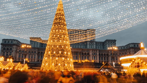 People in front of Christmas tree at Bucharest Christmas Market