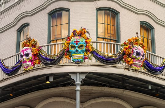 New Orleans, LA - 28 October 2023: Halloween painted skull decorations on tradional New Orleans building in the French Quarter