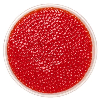 Red caviar in a plastic bowl on an isolated background, top view
