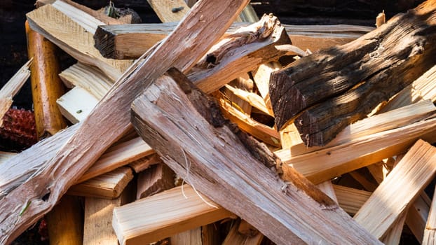 Barbecue preparation with burning wood chips to form coal.