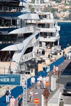 Monaco, Monte Carlo, 28 September 2022 - a lot of luxury yachts at the famous motorboat exhibition in the principality, the most expensive boats for the richest people around the world, yacht brokers. High quality photo