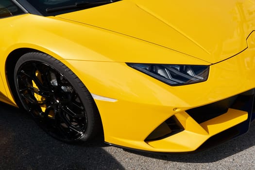 Monaco, Monte Carlo, 29 September 2022 - Close-up view of yellow sports car Lamborghini on street. High quality photo