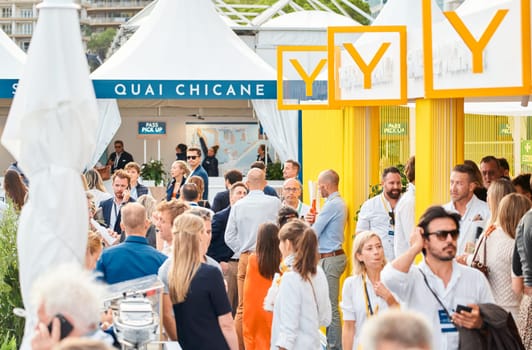 Monaco, Monte Carlo, 29 September 2022 - The famous motorboat exhibition, mega yacht show, clients and yacht brokers discuss the novelties of the boating industry, look at the mega yachts presented. High quality photo