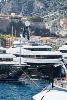 Monaco, Monte Carlo, 28 September 2022 - a lot of luxury yachts at the famous motorboat exhibition in the principality, the most expensive boats for the richest people around the world, yacht brokers. High quality photo