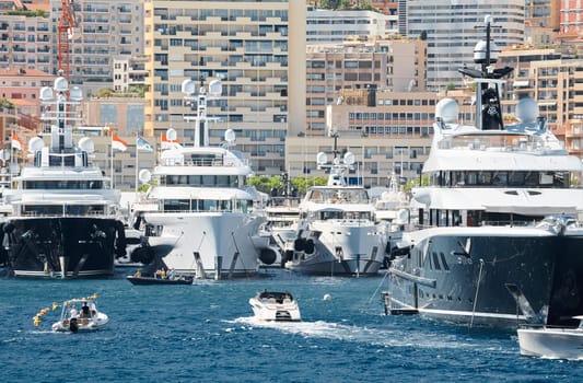 Monaco, Monte Carlo, 28 September 2022 - Top view of the famous yacht show, exhibition of luxury mega yachts, the most expensive boats for the richest people around the world, yacht brokers. High quality photo