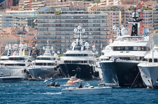 Monaco, Monte Carlo, 28 September 2022 - Top view of the famous yacht show, exhibition of luxury mega yachts, the most expensive boats for the richest people around the world, yacht brokers. High quality photo