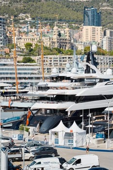 Monaco, Monte Carlo, 28 September 2022 - a lot of luxury yachts at the famous motorboat exhibition in the principality, the most expensive boats for the richest people around the world, yacht brokers. High quality photo