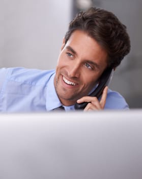 Businessman, phone call and smile on landline in workplace, contact and consulting in office. Businessperson, professional and communication or discussion, technology and connection for networking.