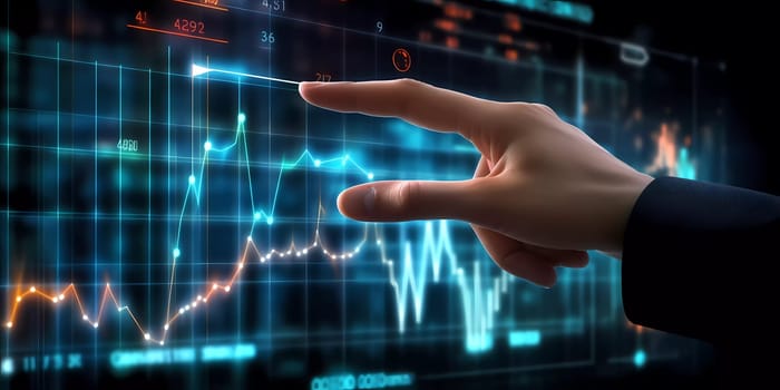 Humans hand shows on hi-tech cyber digital screen with financial graphs. Business analytics concept image