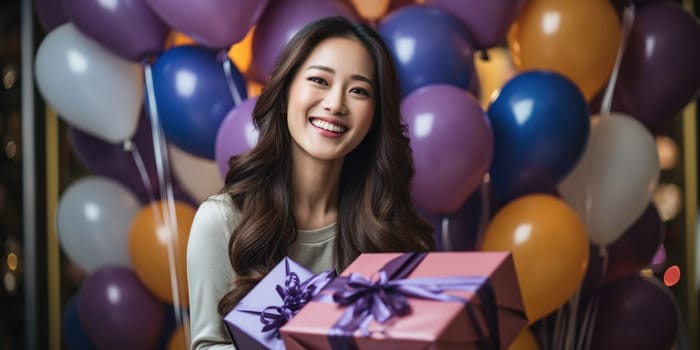 People, joy, fun and happiness concept. happy asian birthday woman holding with gift box, balloons in the background. AI Generated