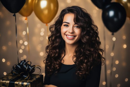 People, joy, fun and happiness concept. happy mixed race birthday woman holding with gift box, gold and black balloons in the background. AI Generated