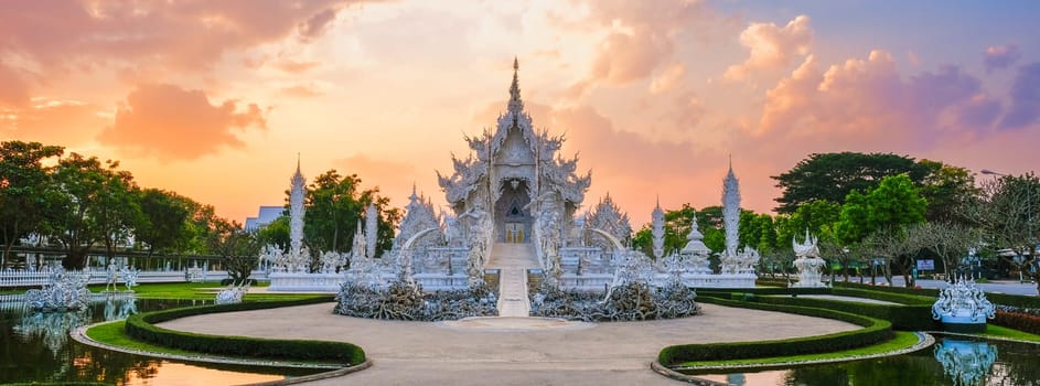 Sunset at the White Temple Chiang Rai Thailand, Wat Rong Khun, Northern Thailand.
