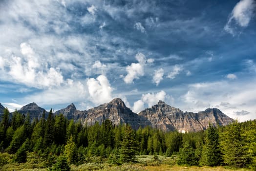 Canada Rocky Mountains Panorama on cloudy sky