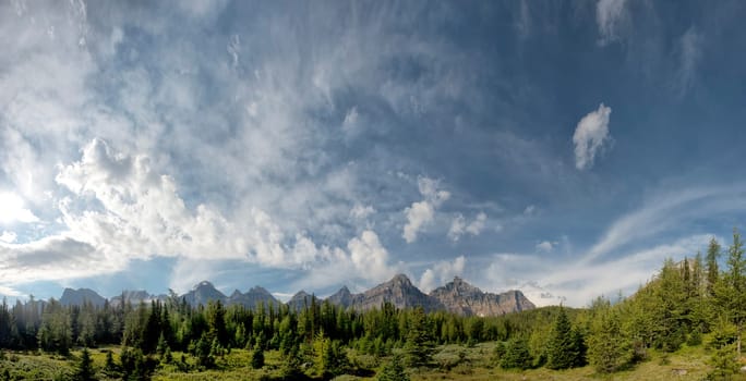 Canada Rocky Mountains Panorama on cloudy sky