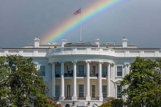 The White House in Washington DC on colorful rainbow sky background